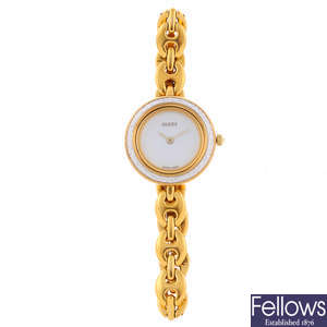 GUCCI - a lady's gold plated bracelet watch.