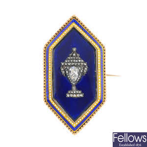 A late Georgian gold diamond and enamel mourning urn brooch.