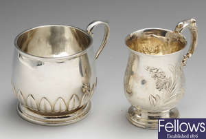 A mid-Victorian silver christening mug & a further 1920's example. (2).