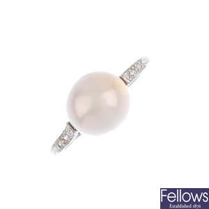 A pearl and diamond ring.