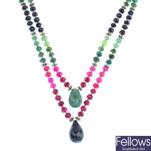 A sapphire, ruby and emerald necklace and a pair of matching earrings.