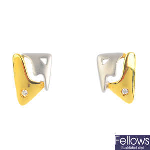 A pair of cubic zirconia earrings.