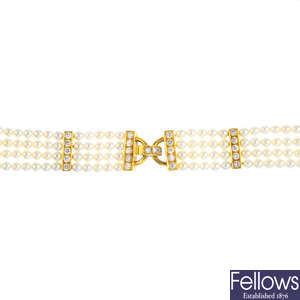 An 18ct gold seed pearl and diamond bracelet.
