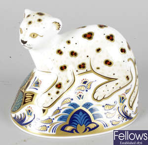 A Royal Crown Derby porcelain paperweight modelled as a leopard cub.