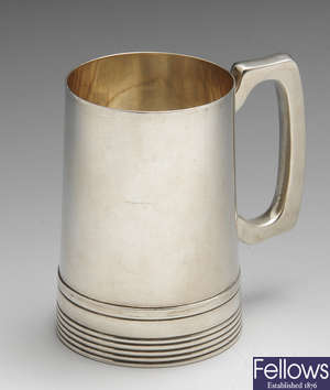 A mid-twentieth century silver mug.