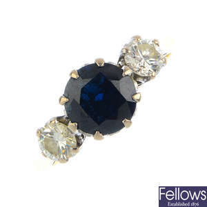 An 18ct gold sapphire and diamond three-stone ring.