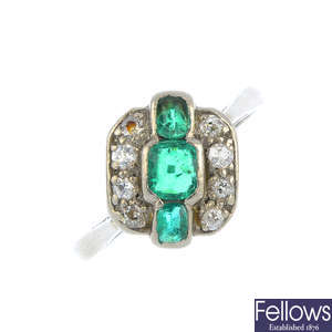 An Art Deco gold and platinum emerald and diamond ring.