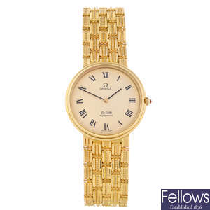 OMEGA - a gentleman's 18ct yellow gold De Ville bracelet watch.