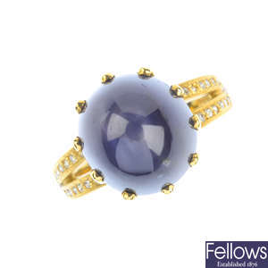 An 18ct gold star sapphire and diamond ring.