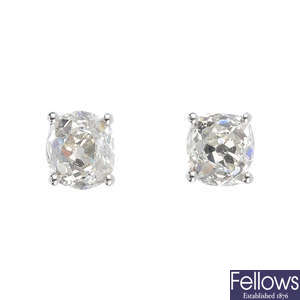A pair of 18ct gold old-cut diamond stud earrings.