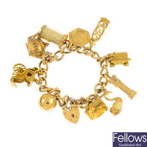 A mid 20th century 9ct gold charm bracelet.