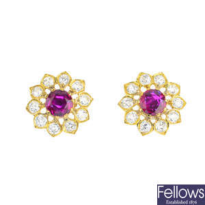 A pair of Burmese ruby and diamond floral cluster earrings.