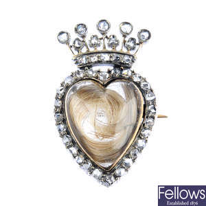 A 19th century silver and gold diamond crowned heart brooch.