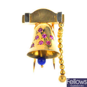 LA CLOCHE - a mid 20th century ruby and lapis lazuli bell clip.