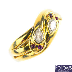 An 18ct gold diamond and ruby snake ring.