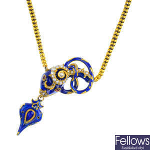 A mid Victorian gold enamel and gem-set snake necklace.