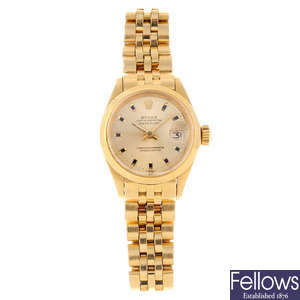 ROLEX - a lady's yellow metal Oyster Perpetual Datejust bracelet watch.