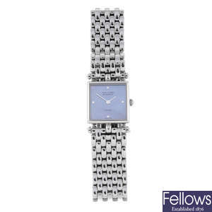 VAN CLEEF & ARPELS - a lady's stainless steel Classique bracelet watch.