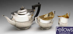 A matched early twentieth century three piece silver tea service.
