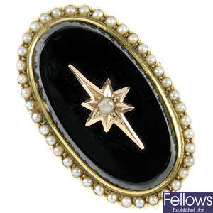 A late Victorian 9ct gold onyx and split pearl memorial ring.