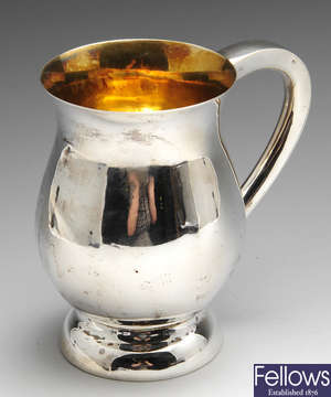 A modern silver mug. 