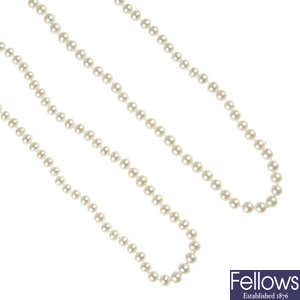 Four long cultured pearl necklaces.