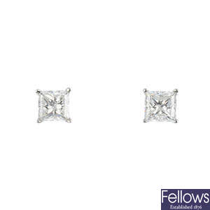 A pair of 18ct gold square-shape diamond stud earrings.