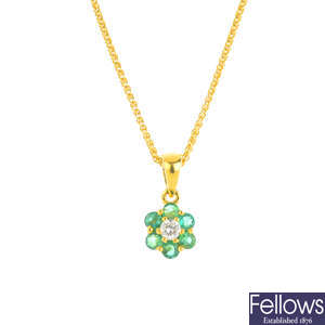 An 18ct gold emerald and diamond pendant, with 18ct gold chain.