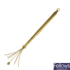 ASPREY - an early 20th century 18ct gold swizzle stick.