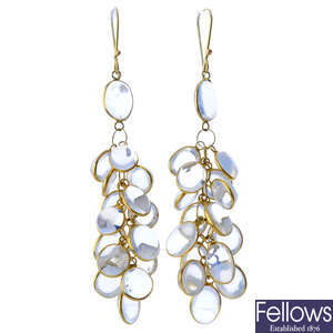 A pair of moonstone earrings.