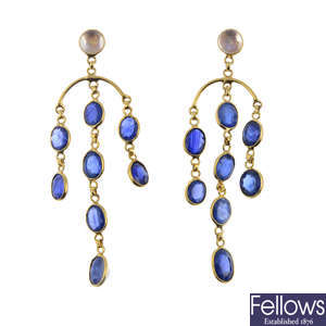 A pair of sapphire and moonstone earrings.