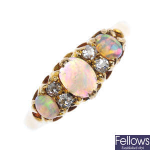 An early 20th century 18ct gold opal three-stone ring.