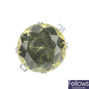 A chrysoberyl single-stone and diamond ring.