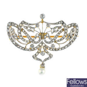 A diamond and cultured pearl brooch.
