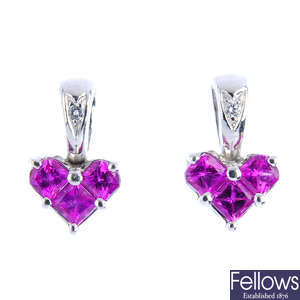 A pair of synthetic ruby and diamond stud earrings.