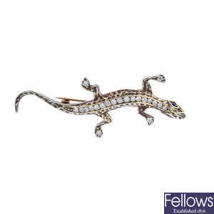 A 9ct gold diamond and sapphire salamander brooch.