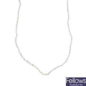 A seed pearl single-strand necklace.