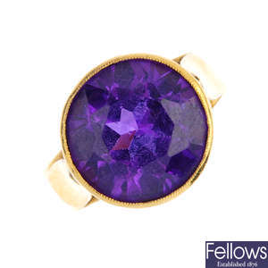 A 22ct gold synthetic colour-change sapphire ring.