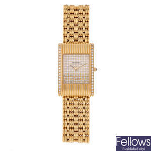 BOUCHERON - a lady's 18ct yellow gold bracelet watch.