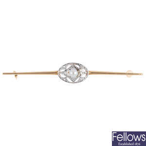MIKIMOTO - an early 20th century gold cultured pearl and diamond bar brooch.