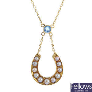 An early 20th century gold split pearl and aquamarine necklace.
