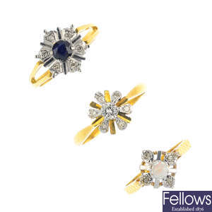 Three gem-set and diamond cluster rings.