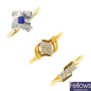 Three sapphire and diamond rings.