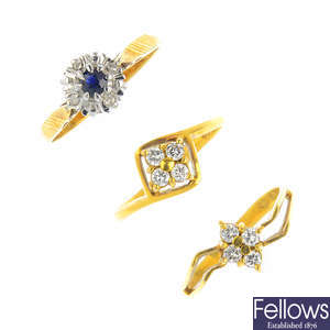 Three 18ct gold diamond and gem-set rings.