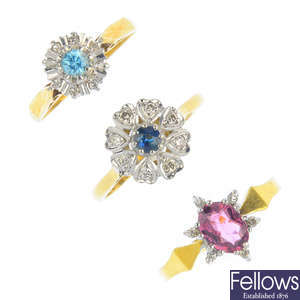 Three 18ct gold diamond and gem-set rings.