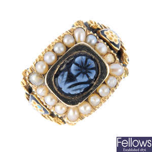 A Georgian gold onyx cameo, split pearl and enamel mourning ring.