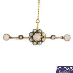 An early 20th century gold opal and split pearl brooch.