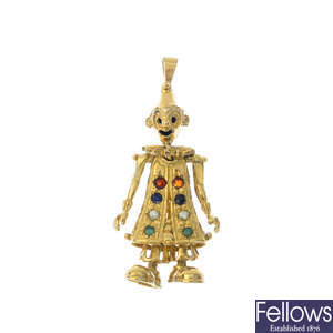 A 9ct gold diamond and gem-set clown pendant.