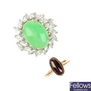 A jade ring, a garnet ring, a further ring and a cameo pendant.