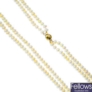 Three cultured pearl two-row necklaces.